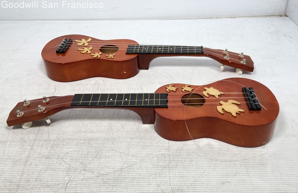 2 Universal Worldwide Trading Inc 4-String Soprano Ukuleles