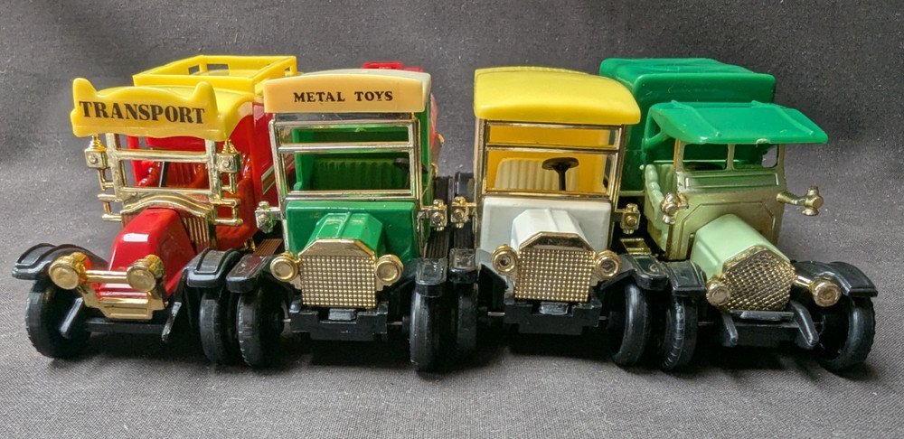 4 Die Cast Vans -
