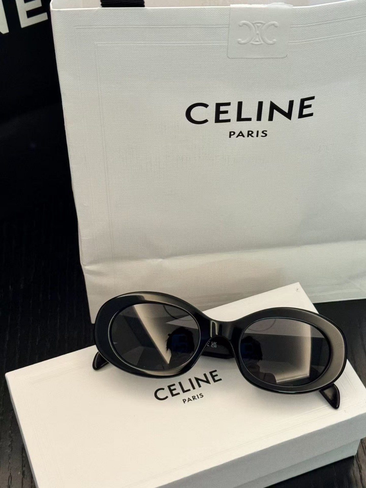Celine CL40194U Triomphe Oval Sunglasses Black Frame Dark Grey Lens Women