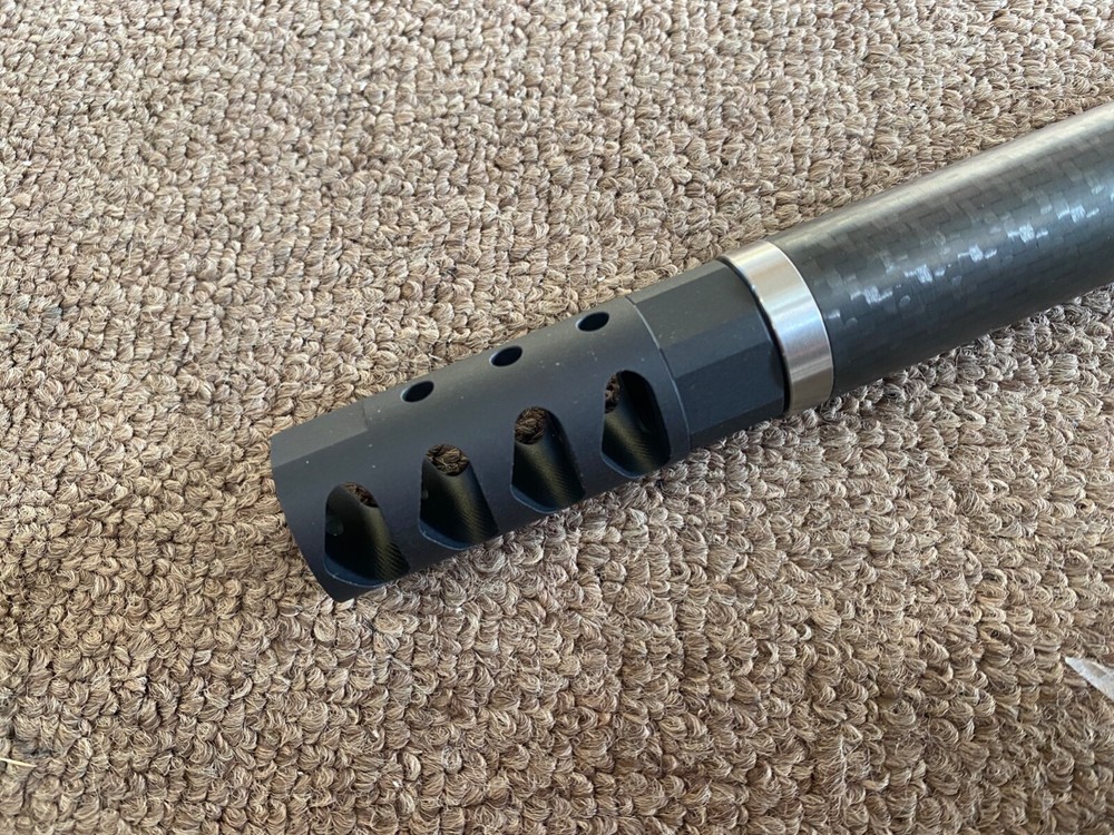 Muzzle brake, 6.5mm, lite weight, self timing,  4 port, 5/8-24 thread.