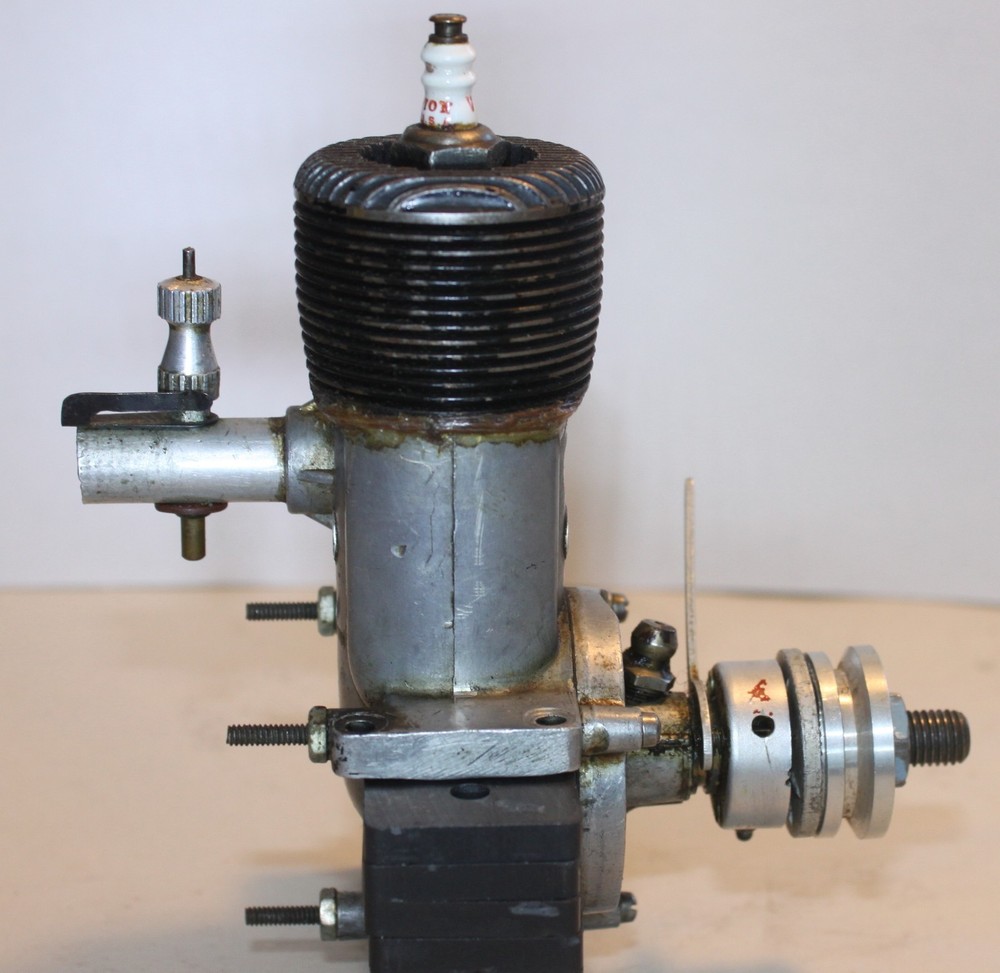 Lot 386, Ohlsson & Rice 60 scale airplane engine, spark plug & points, used