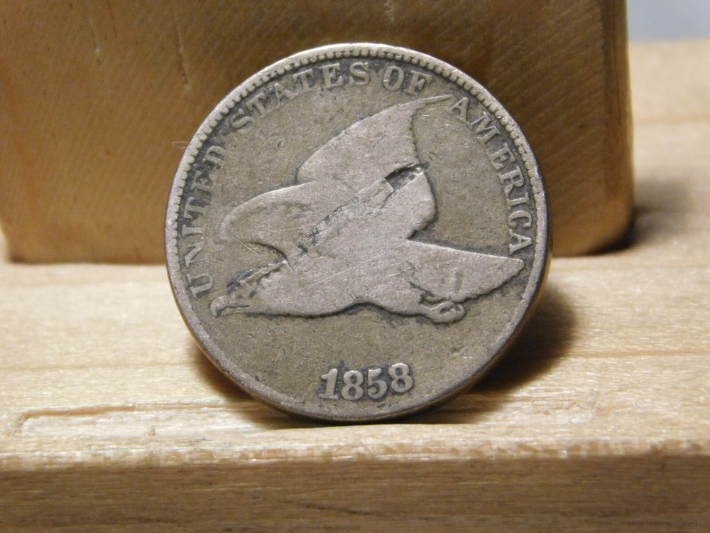 1858 Flying Eagle cent error, lamination across the center