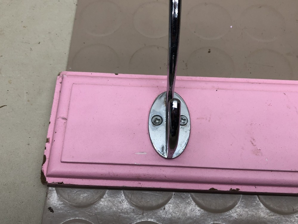 4 Chrome Hooks on Pink Wall Coat Rack
