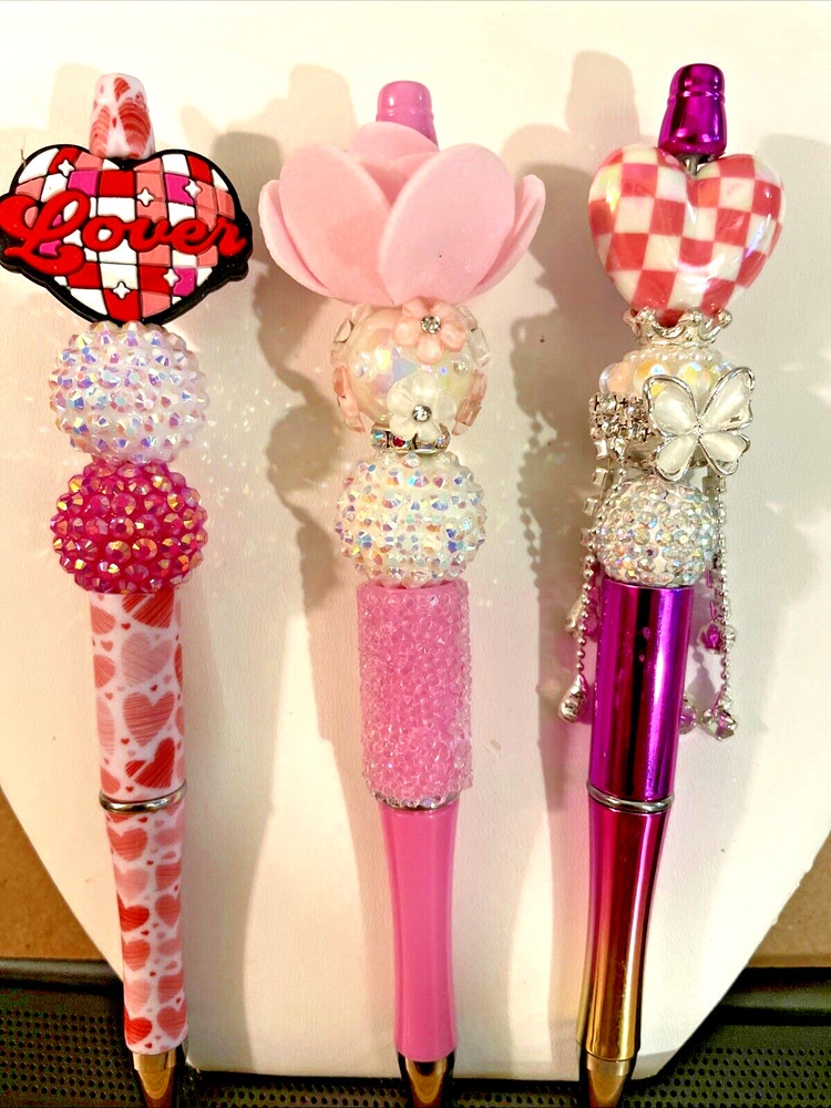 3 miscellaneous beaded pens with 1 ink refill each