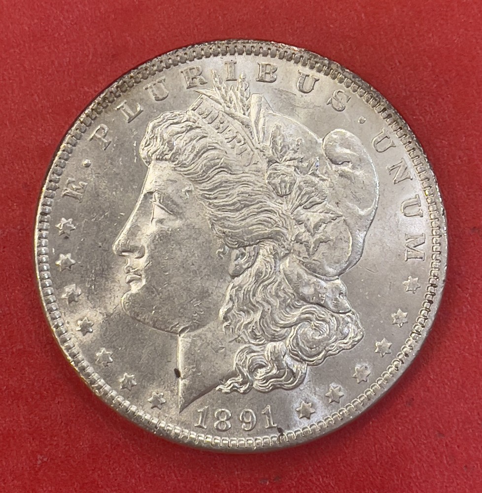 1891 P Morgan Silver Dollar, Choice to Gem Uncirculated.