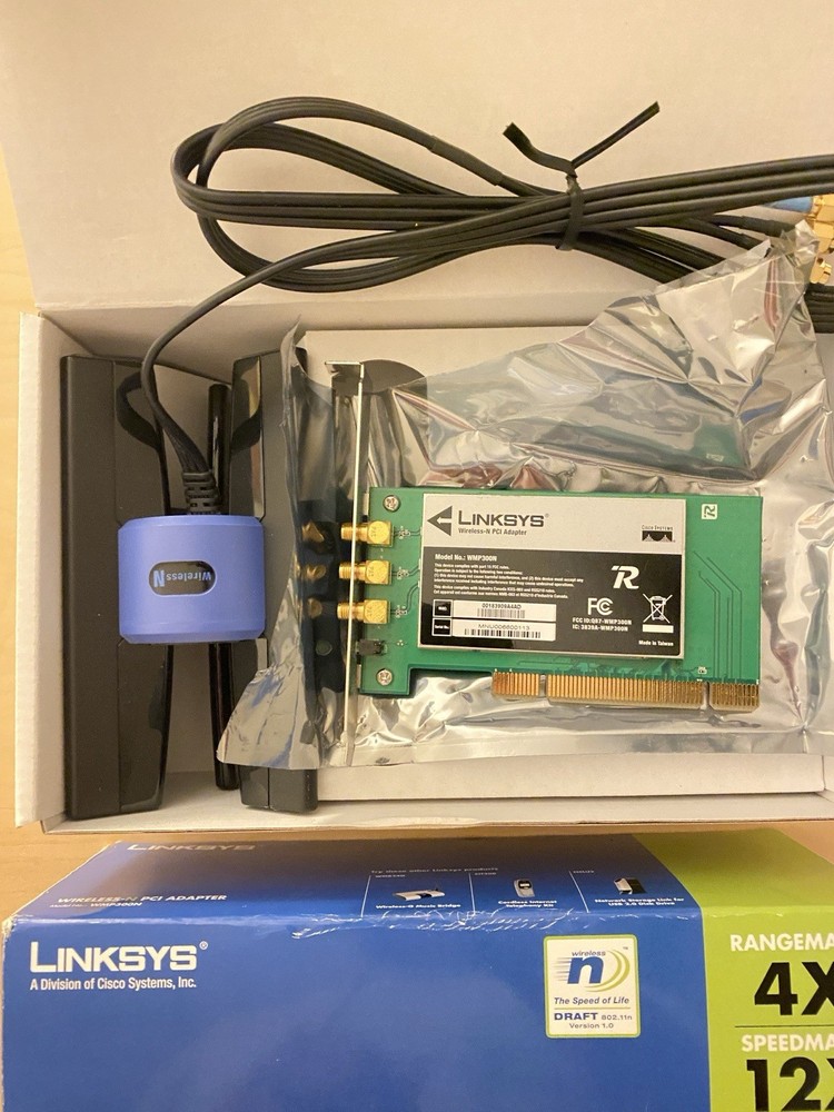 Linksys WMP300N Wireless‑N PCI Adapter With Box & Antenna Base (System Pull)