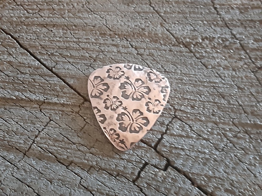 rustic copper guitar pick - playable and handmade - hibiscus