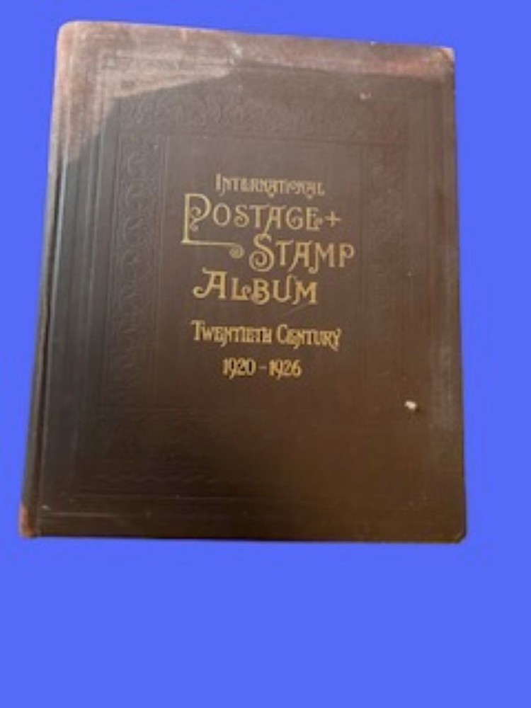 INTERNATIONAL POSTAGE STAMP ALBUM 20TH CENTURY 1920-1926  W/APPROX 63 STAMPS