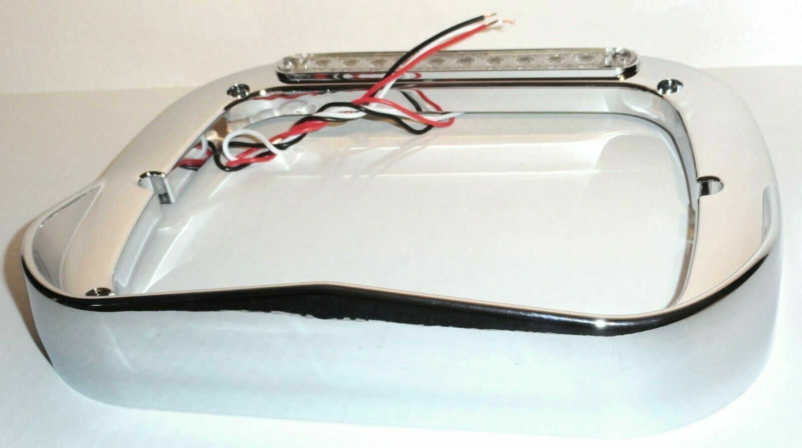 headlight bezel 6x8 clear lens amber LED chrome plastic visor for Peterbilt each