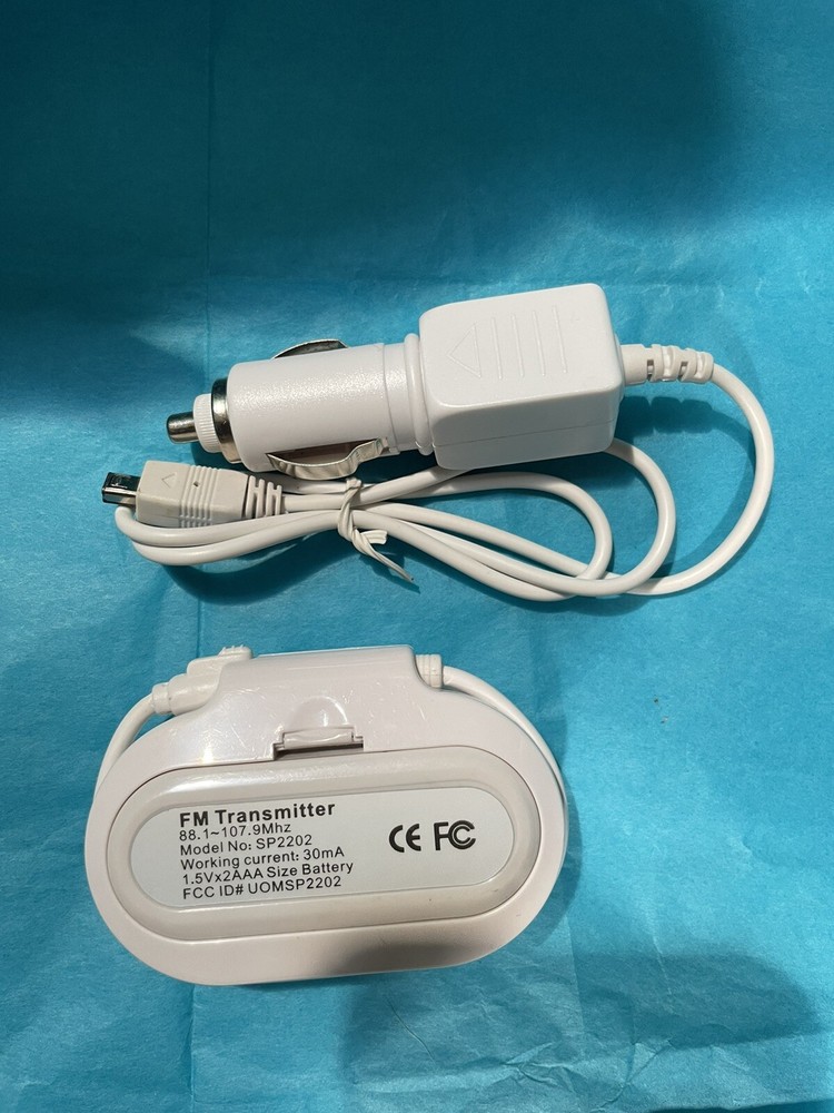 In Car FM Transmitter w Charger Model SP2202