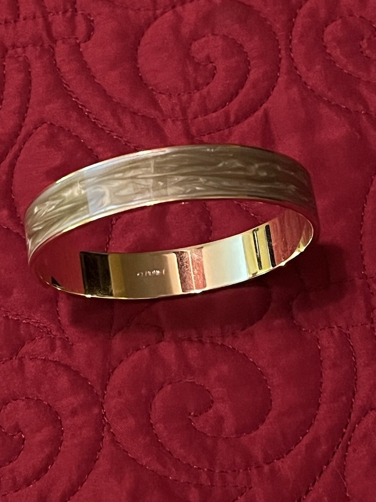 MONET LIGHT GREEN BANGLE BRACELET 2 1/2 DIAMETER.SIGNED.