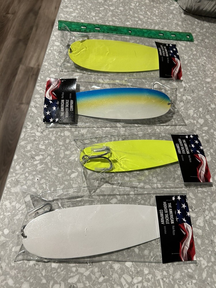 9” 5 ounce sparkle white Flutter Spoon￼ striped bass striper