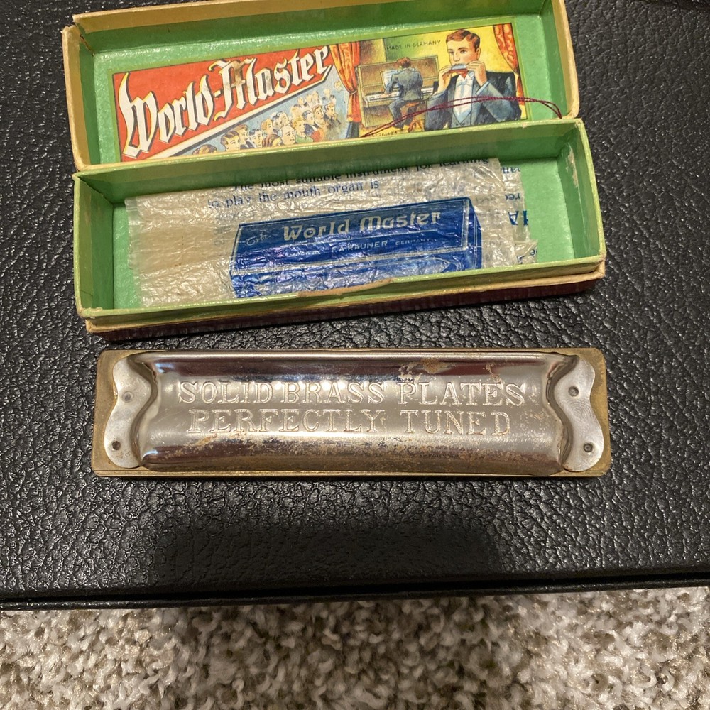 Vintage world master brass harmonica