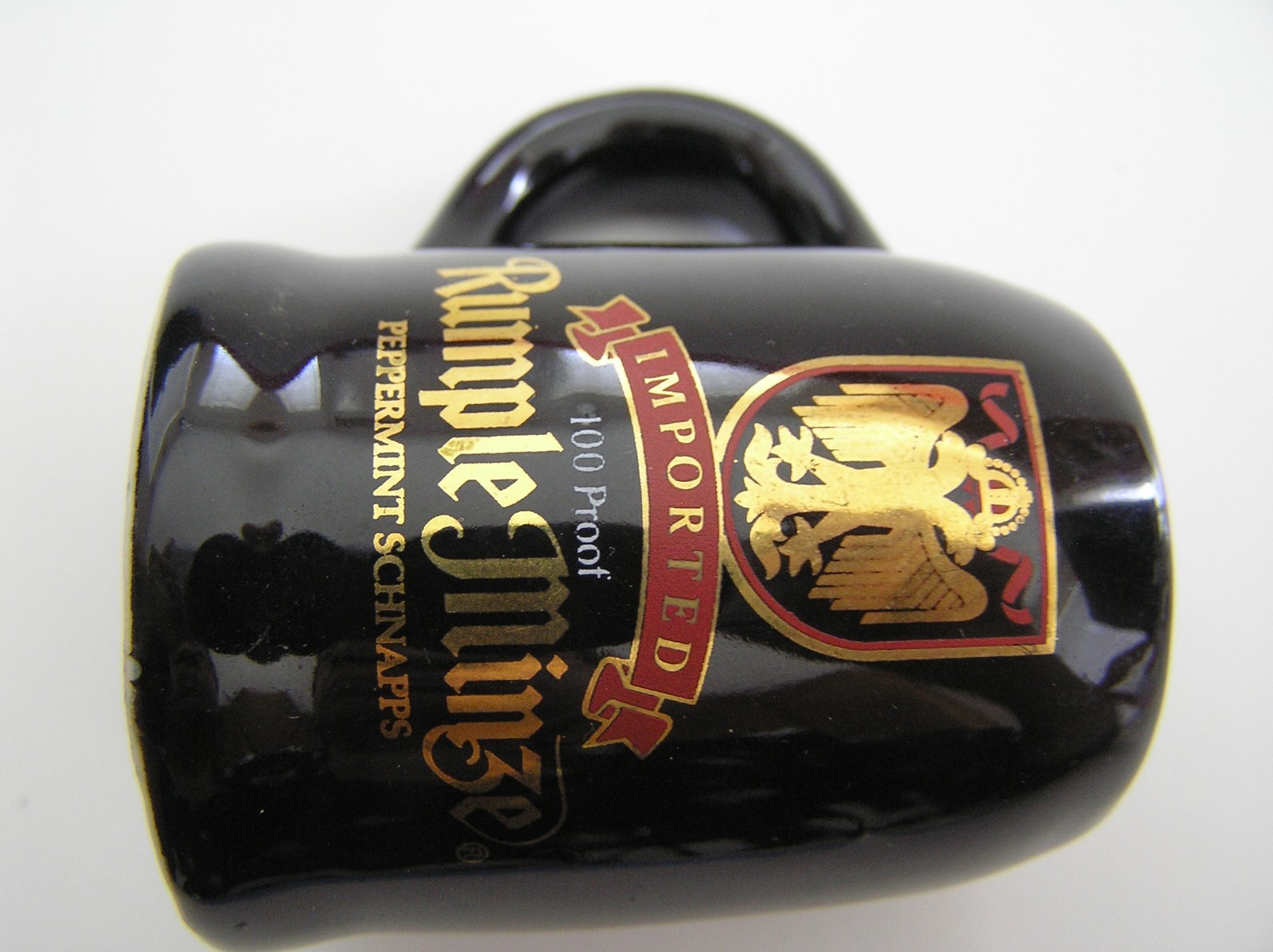 2 Souvenirs Shot Mugs: A Black Rumple Minze and A Clear Nashville 5cents Beer