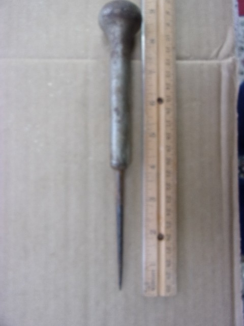 vintage spring loaded cast awl
