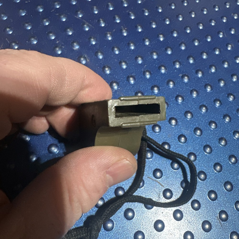 Vintage WW2 U.S. Navy 1944 dated OD Plastic Whistle with Black Lanyard Works