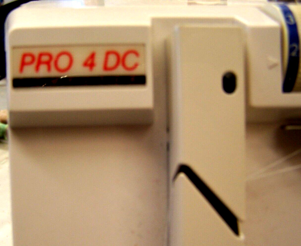 used Elna Lock Pro 4 DC Overlock Serger Machine plus Accessories powers up