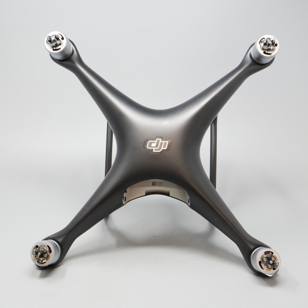 DJI Phantom 4 Quadcopter Drone Only no controller camera battery --- plus Props