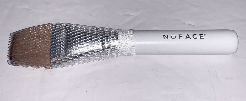 Nuface brush New with protective wrap white