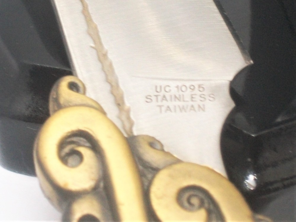 Vintage Knife Decor on Black Lacquer Stand