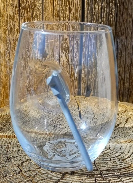Edwards AFB Fire & Emergency Services glass w/axe embedded