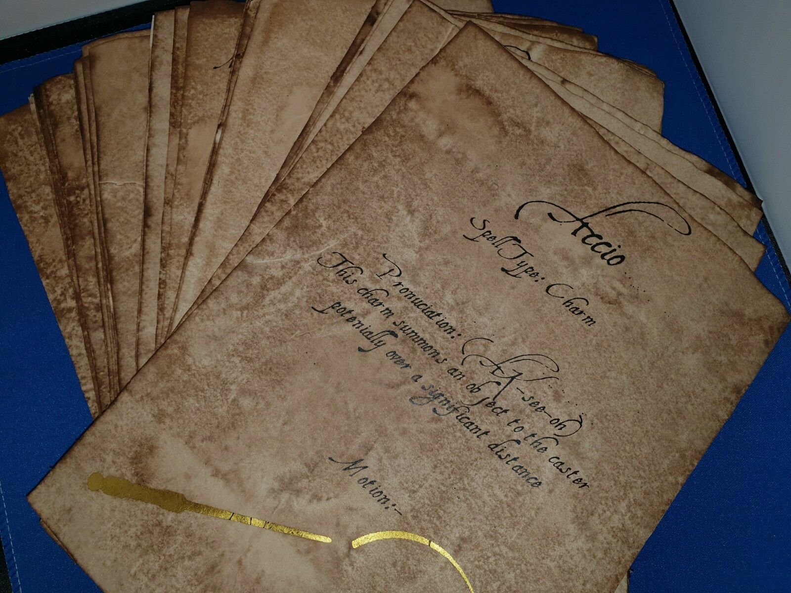 34 x Harry Potter, Hogwarts Spell Sheets with gold leaf. Replica / prop.