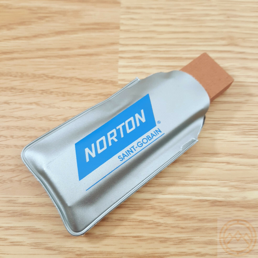 Norton Small Sportsman Fine Grit Pocket Stone Measures 3" x 7/8" x 3/8" Orange