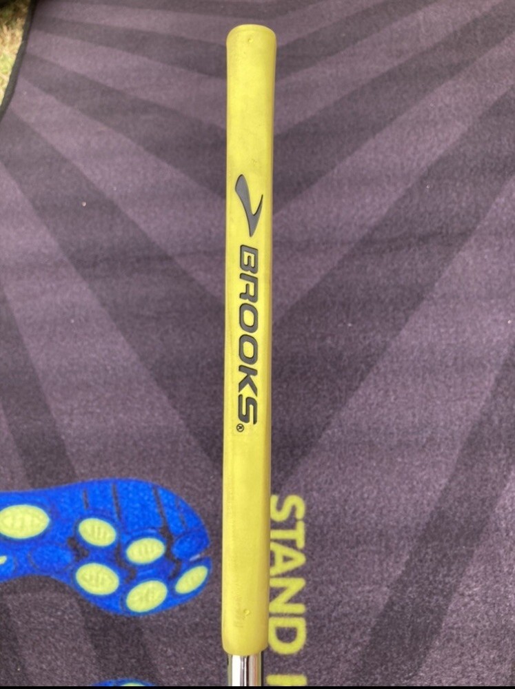 Brooks golf putter with putting mat