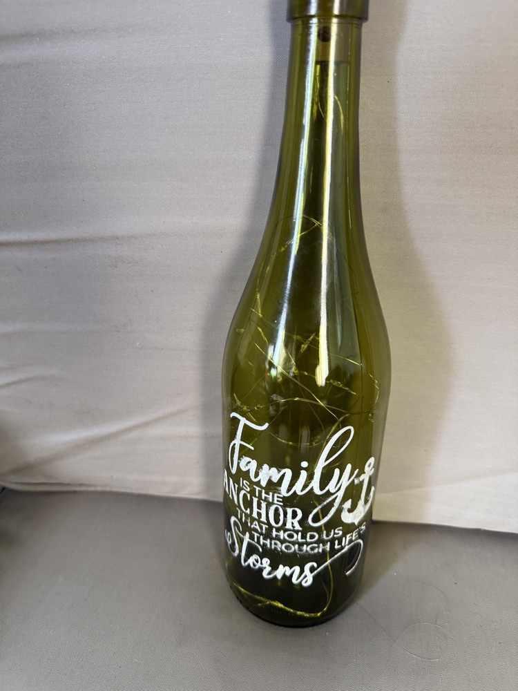 Lighted wine bottle with on/off switch in cork.