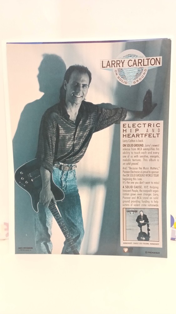 LARRY CARLTON PROMO AD FOR ON SOLID GROUND 1989  - 11 X8.5- PRINT AD.  9