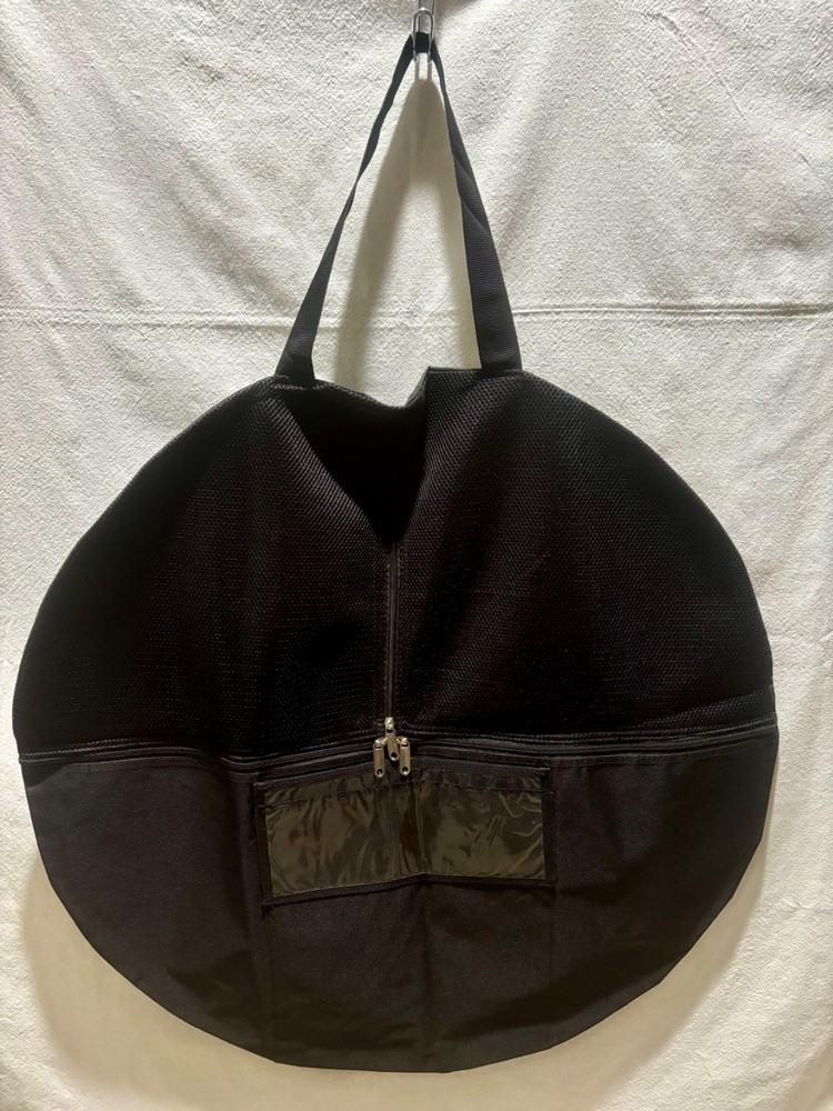 Storage for a large collapsible photography reflector (or diffuser/scrim)