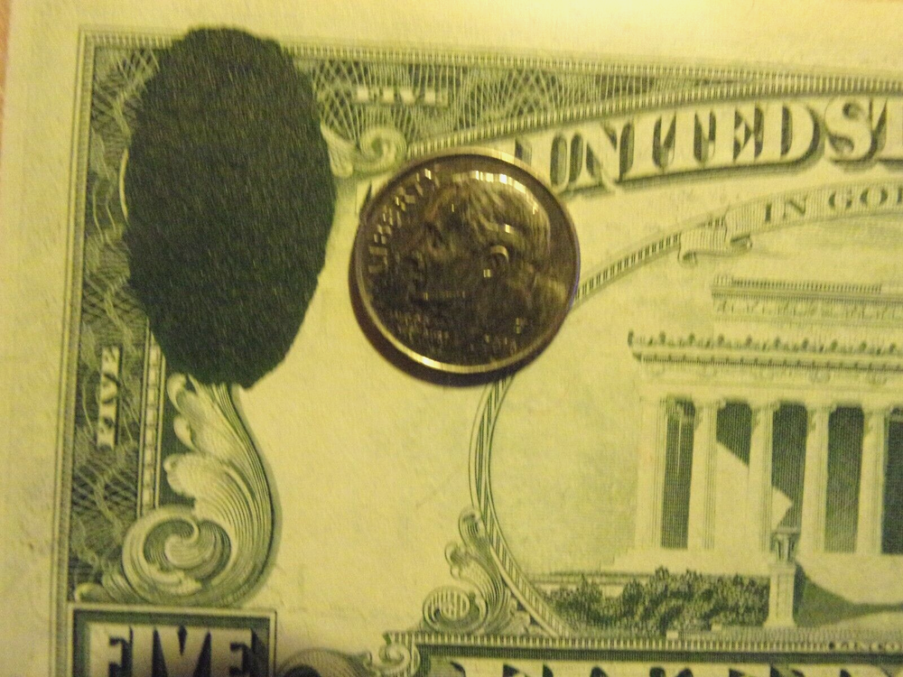 U.S. $5.00 Note Inking Error - Mint, Uncirculated.