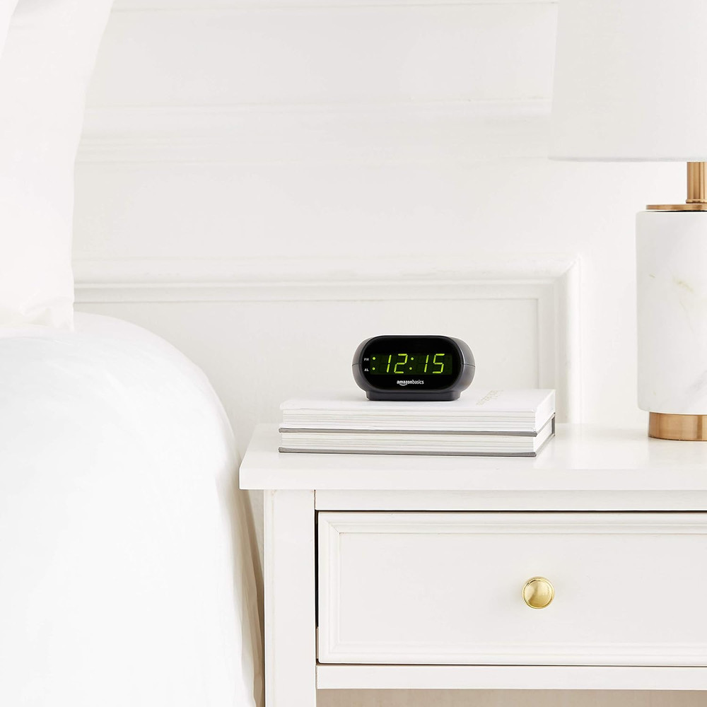 Amazon Basics Small Digital Oval Alarm Clock with LED Display, Nightlight & Batt