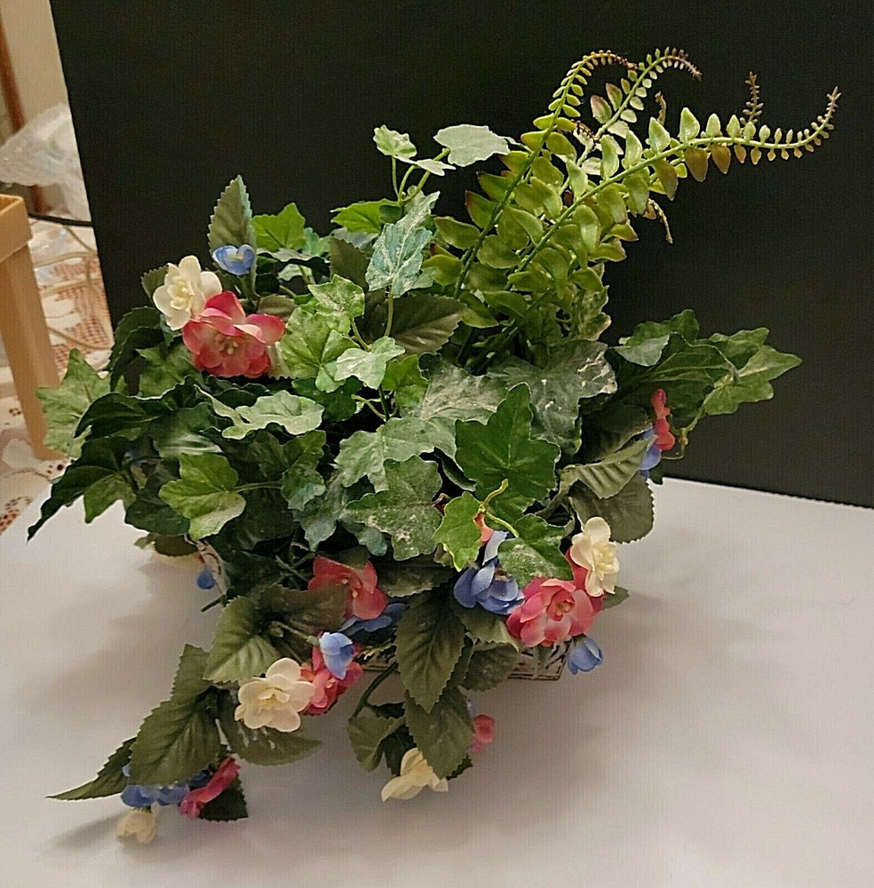CREAM TIN RECTANGULAR PLANTER WITH HANDLES FILLED WITH FLOWERS