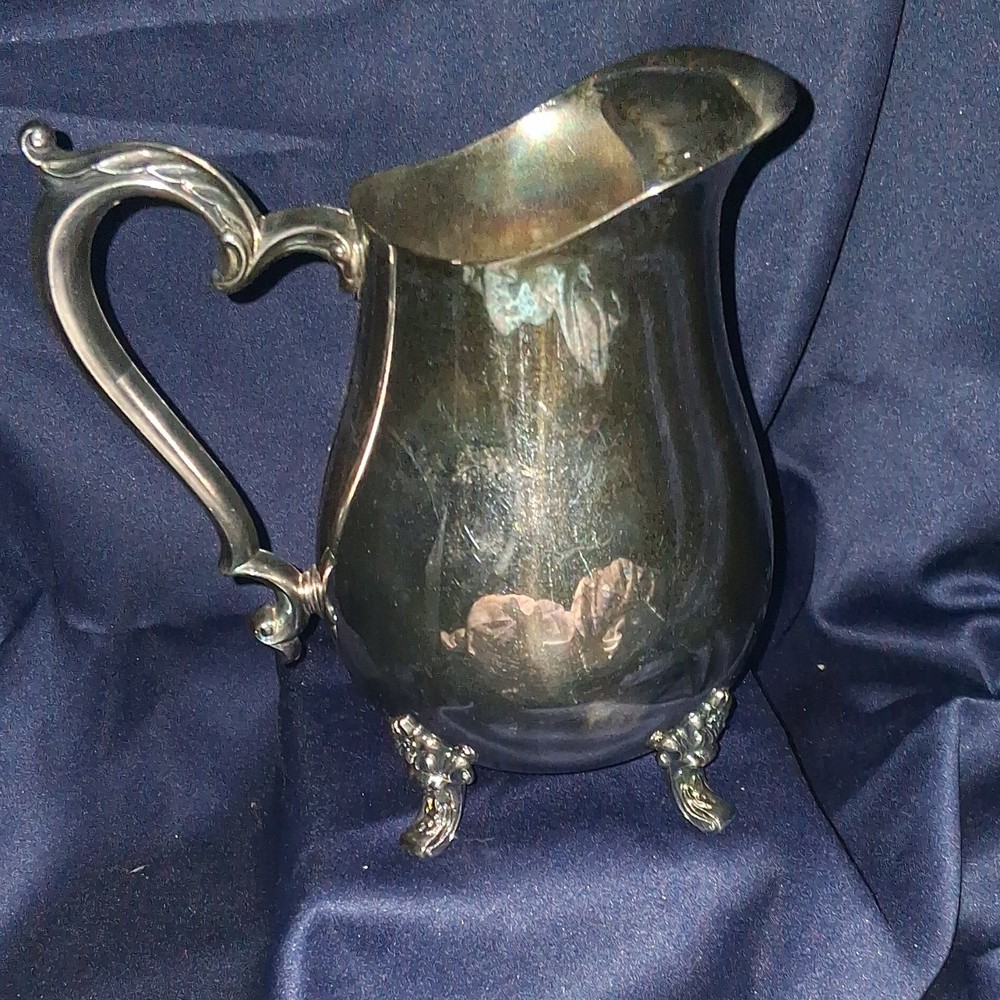 vintage Oneida silver-plated water pitcher.