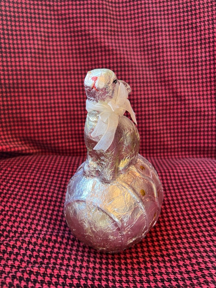 Faux Foil Large Easter Bunny sitting on an Easter Egg