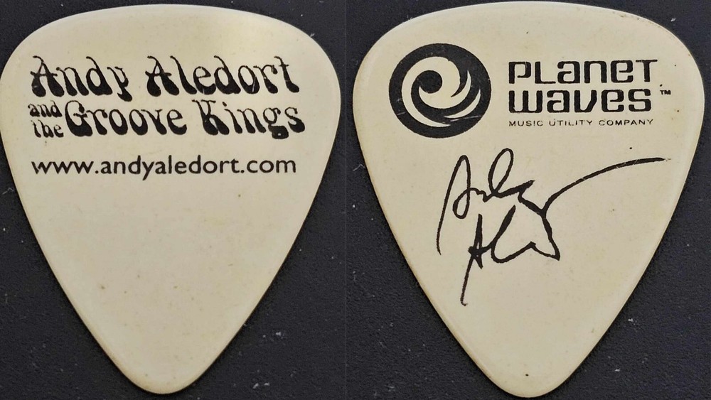 Andy Aledort white guitar pick