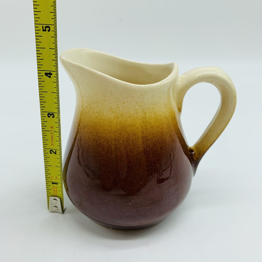 Small brown and white creamer 4.5”