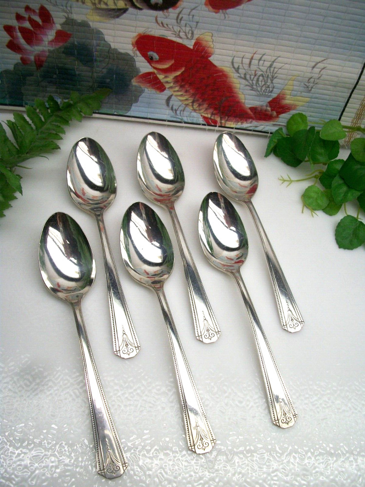 6   Oneida S.L. & G. H. Rogers  THOR   Silverplate  Teaspoons    1933