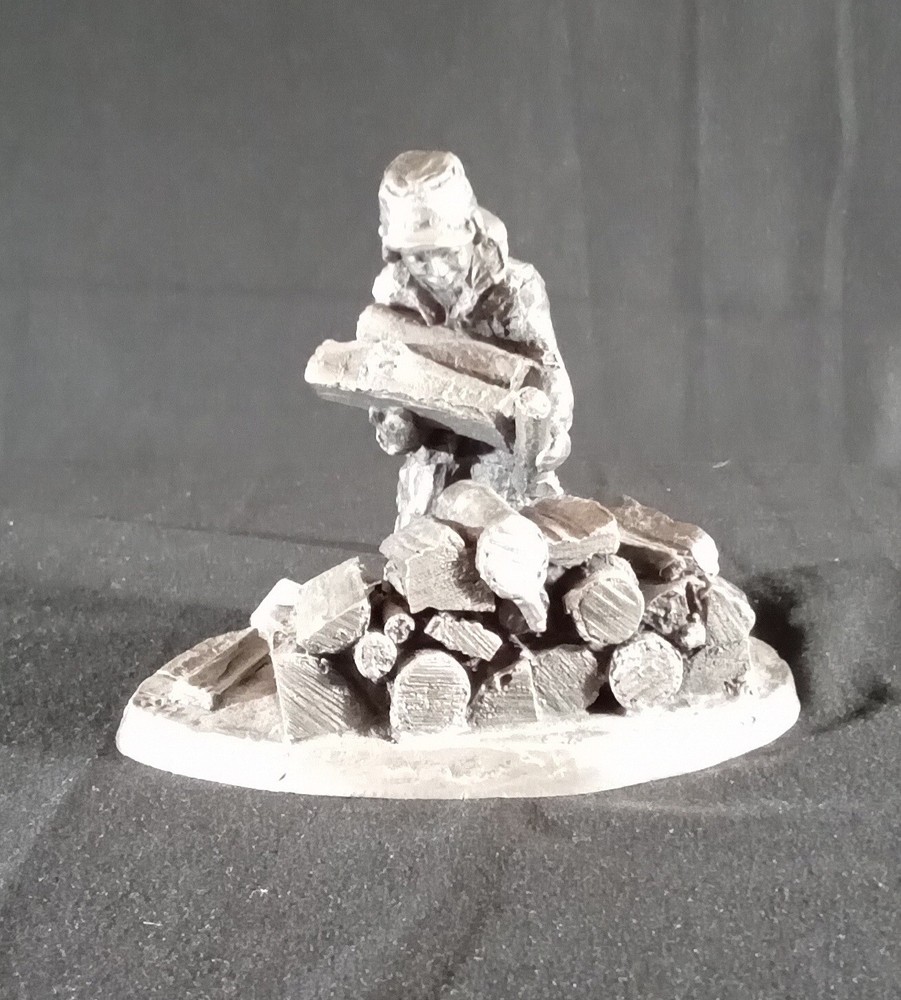 E. Robert Drury 1973 Pewter Figurine 'Boy Stacking Logs'