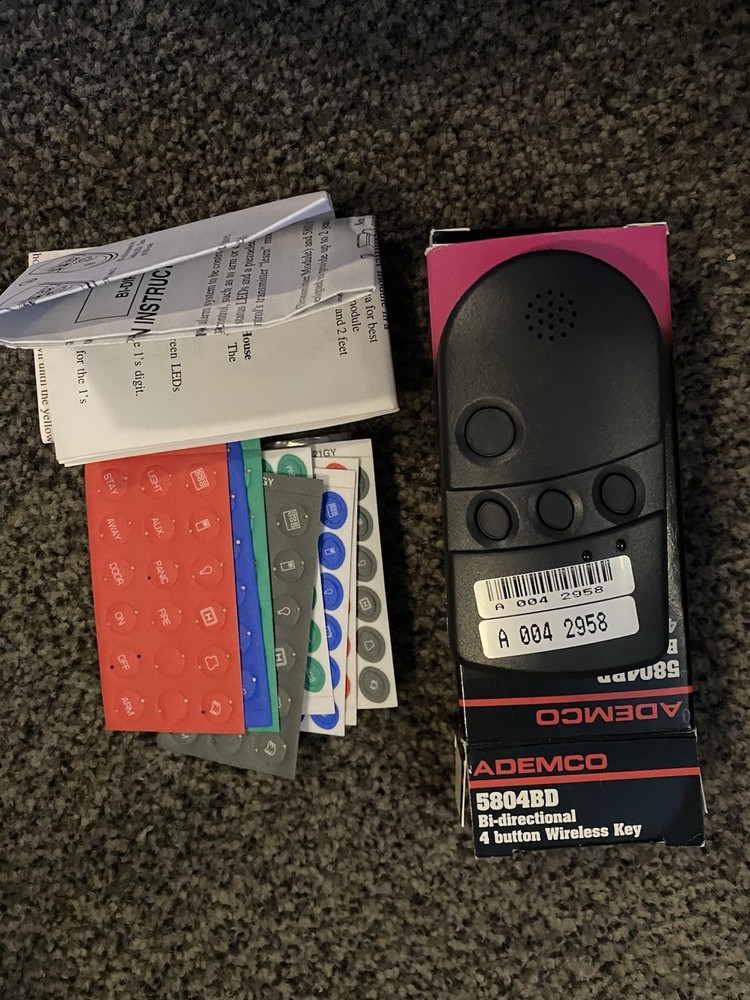 5804BD BI-DIRECTIONAL 4 BUTTON WIRELESS KEY ..open box