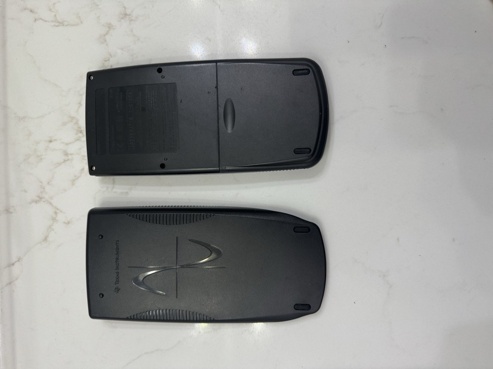 Texas Instruments TI-83 Handheld Graphing Calculator