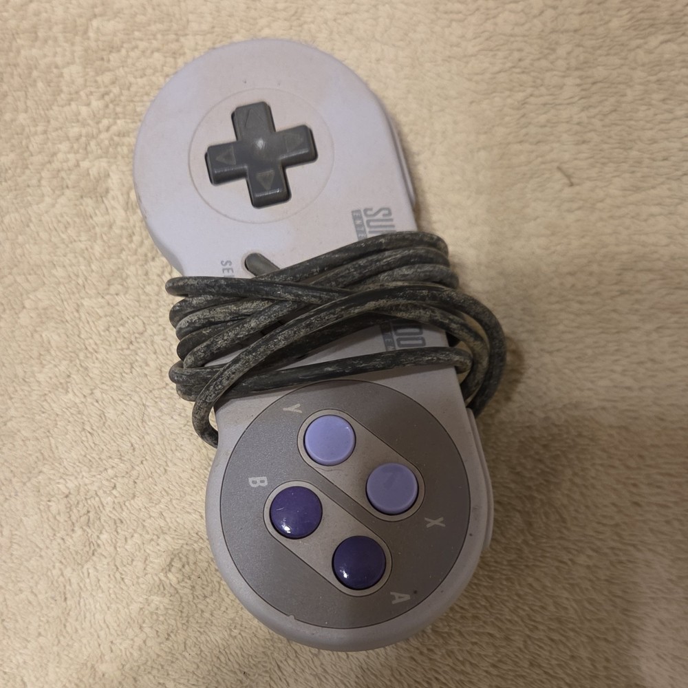 Nintendo SNES classic with controller and cables