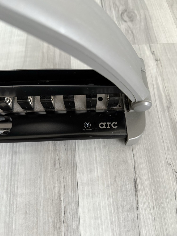 Staples Arc System Adjustable 11 Hole Punch