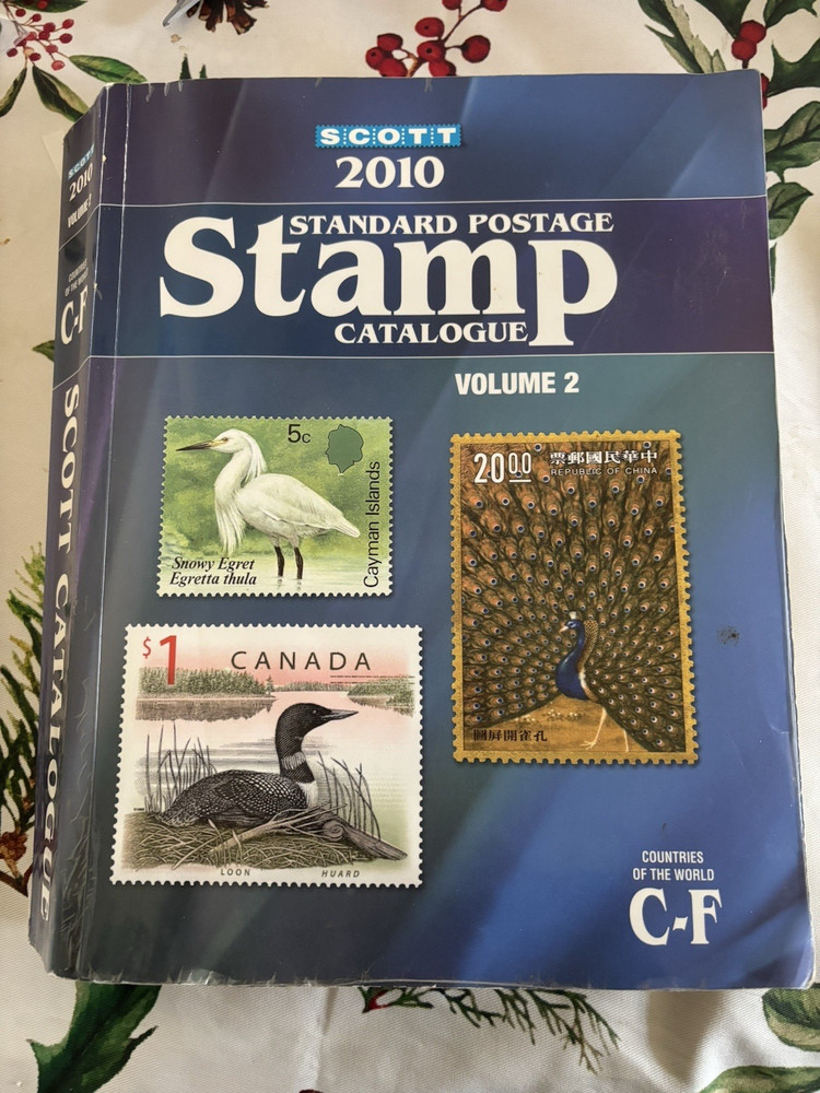 2010 SCOTT STAMP CATALOG VOLUME 2 USED MINOR WEAR AND TEAR.