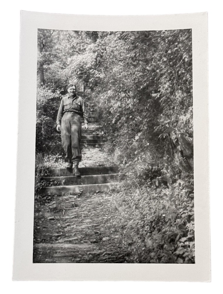 WW2 Era Photo U.S. GI On Steps Between Over Grown Trees Facing Rhine River