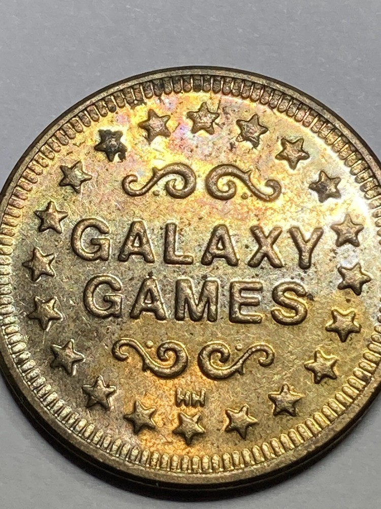VINTAGE GALAXY GAMES VIDEO GAME ARCADE TOKEN - LOOK! (#C3)