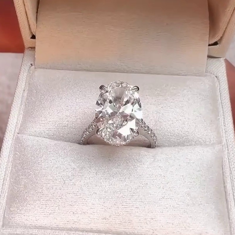 6.3 TCW Oval Cut Moissanite Hidden Halo Engagement Ring In 14k White Gold Plated