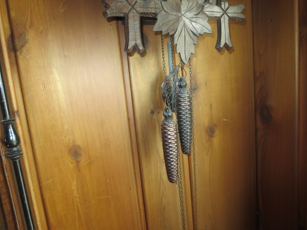 Old Cuckoo clock with articulated bird