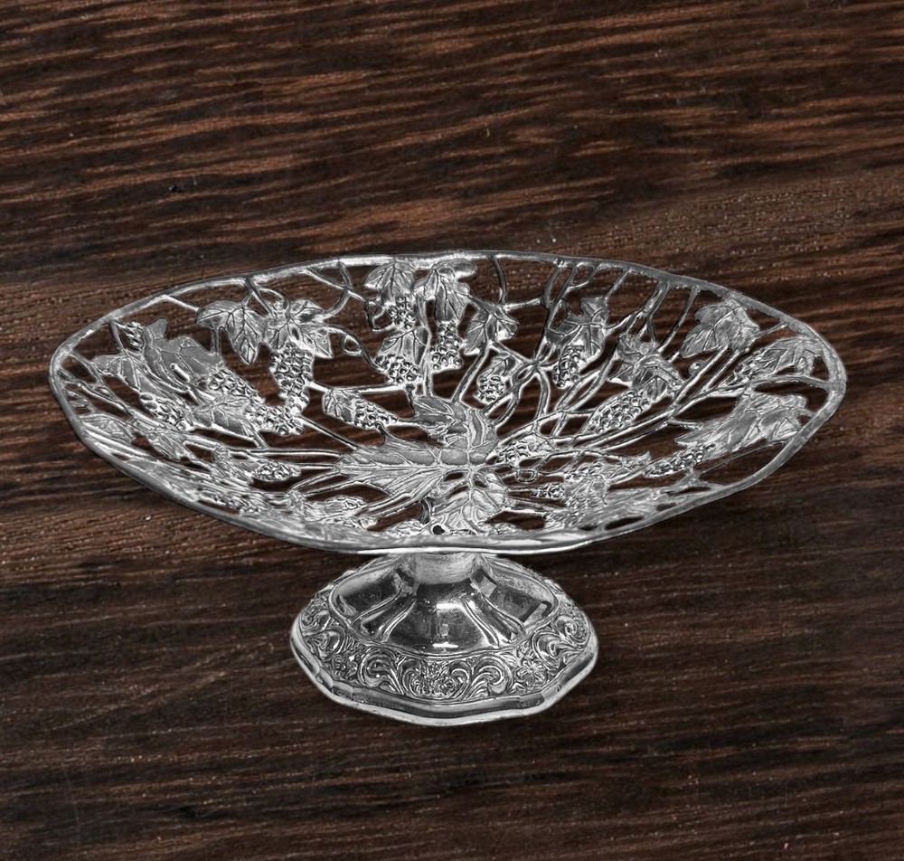 Silver-plated footed centerpiece with intricate grape and vine design